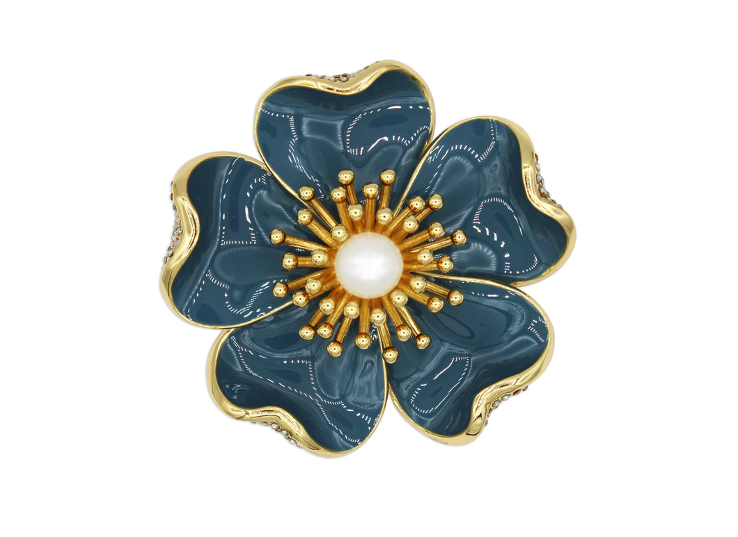Anemone blue brooch with gold accents and a pearl center.